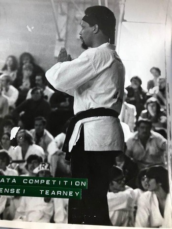 Sensei Greg Tearney performing kata at a tournament during the dojo's competition era