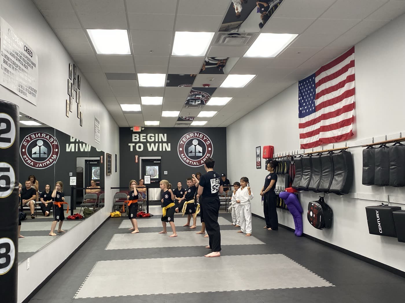 A kids karate class training at Tearney's Township 5 dojo in Camillus